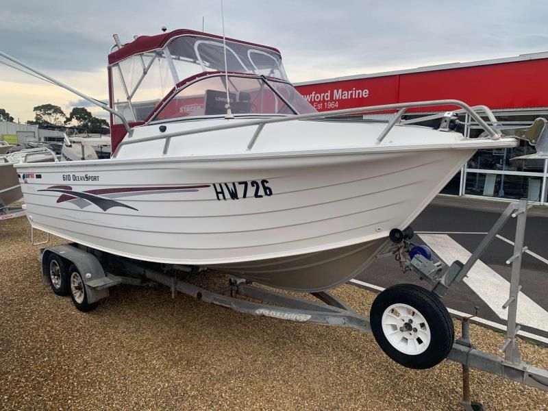 Image for QUINTREX 610 OCEAN SPORT CUDDY CABIN 0