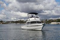 Image for 2004 Caribbean 26 Flybridge Cruiser 4