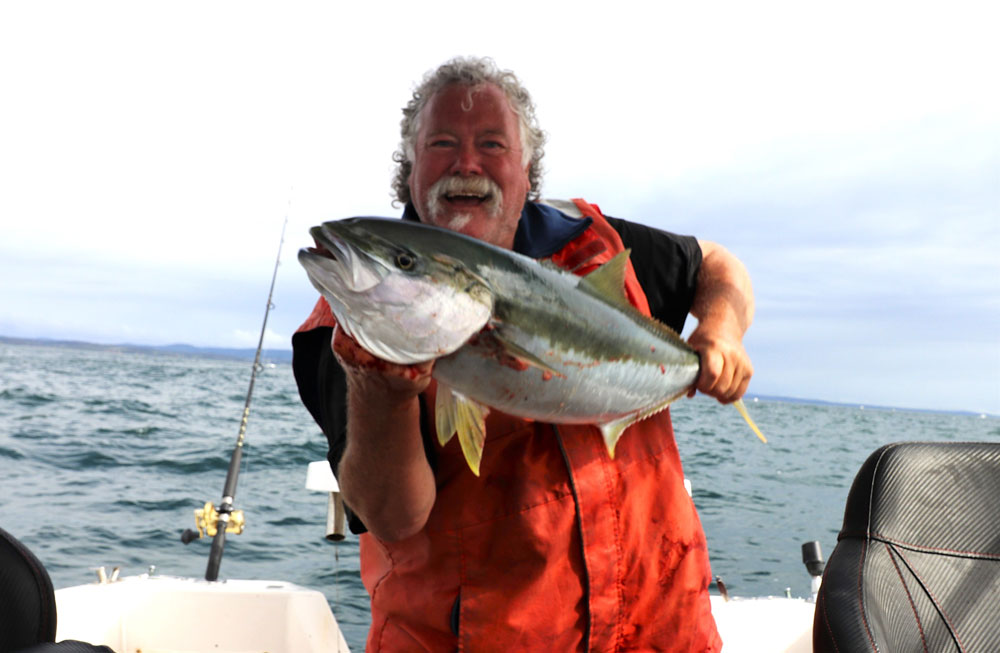 Bear with a nice yellowtail kingfish from Disaster Bay