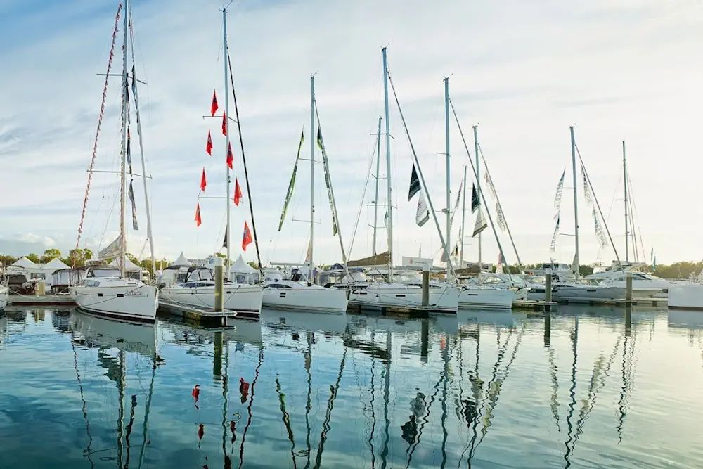 A row of boats in a marina