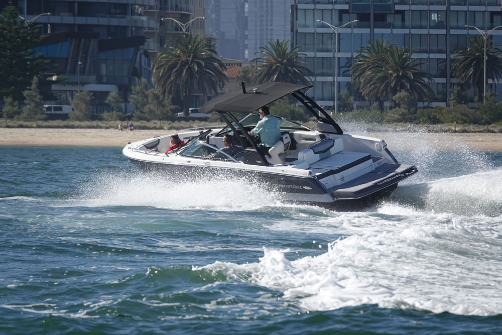 The Chaparral 247 SSX features a large swim platform with infinity power step, a rear bench seat, and starboard seat